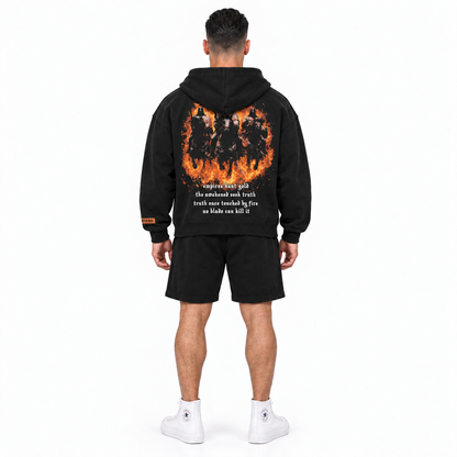 AYKONS [400] Solomon's Secrets Zip hoodie in black and orange - Model 1 straight back full-body shot with matching orange embroidered CERTIFIED shorts and all-white high-top Converse.