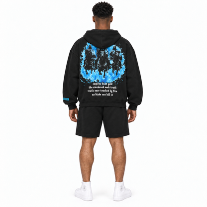 AYKONS [400] Solomon's Secrets Zip hoodie in black and blue - Model 2 straight back full-body shot with matching blue embroidered CERTIFIED shorts and all-white high-top Converse.