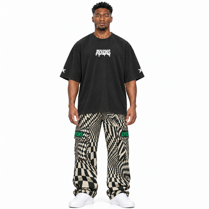 AYKONS Distorted Reality V2 cargo pants and PsySmile tee — model straight front, white Air Force 1 shoes.